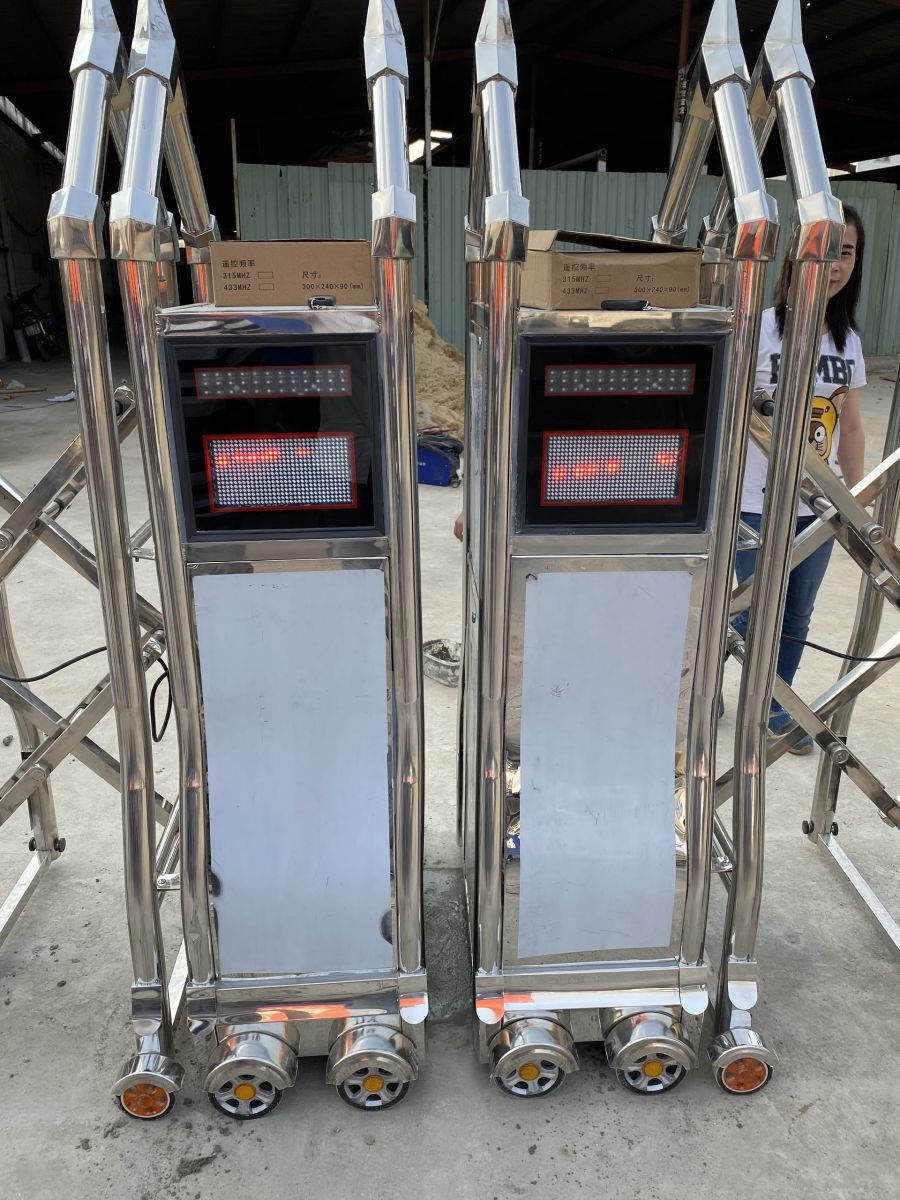 cổng xếp inox 304